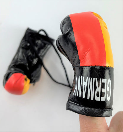<p><strong>Mini Boxing Gloves GERMANY Country Flag National Pride MMA Car Mirror D&eacute;cor</strong></p>